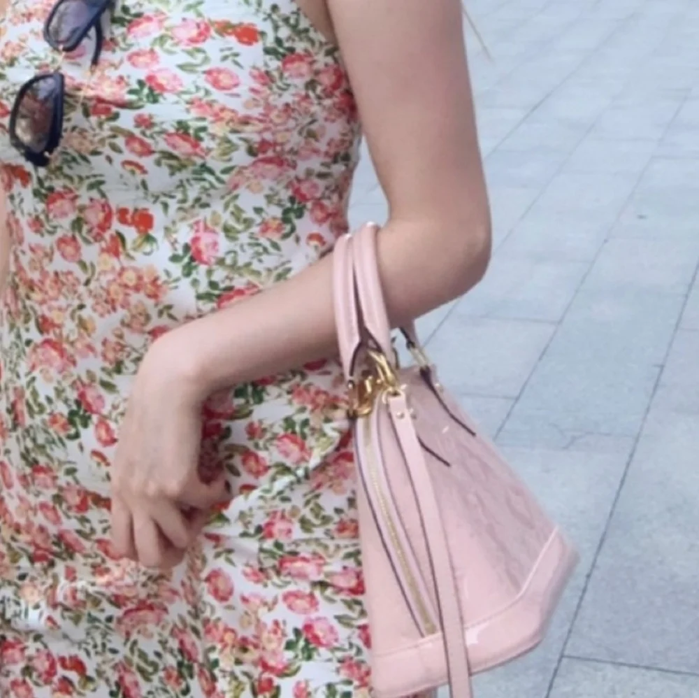 Louis Vuitton Pink Mini Bag with Structured Design and Metal Hardware - Picture 15 of 15